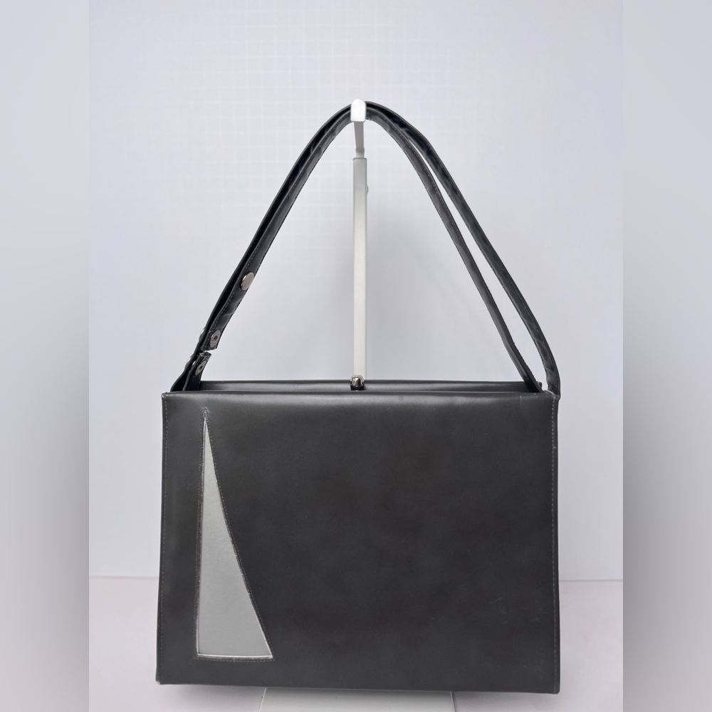 Vintage Mid Century Gray handbag with geometric design.